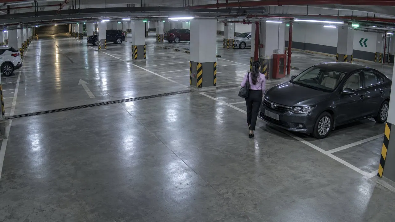 Employee walking alone in the parking at 11 PM